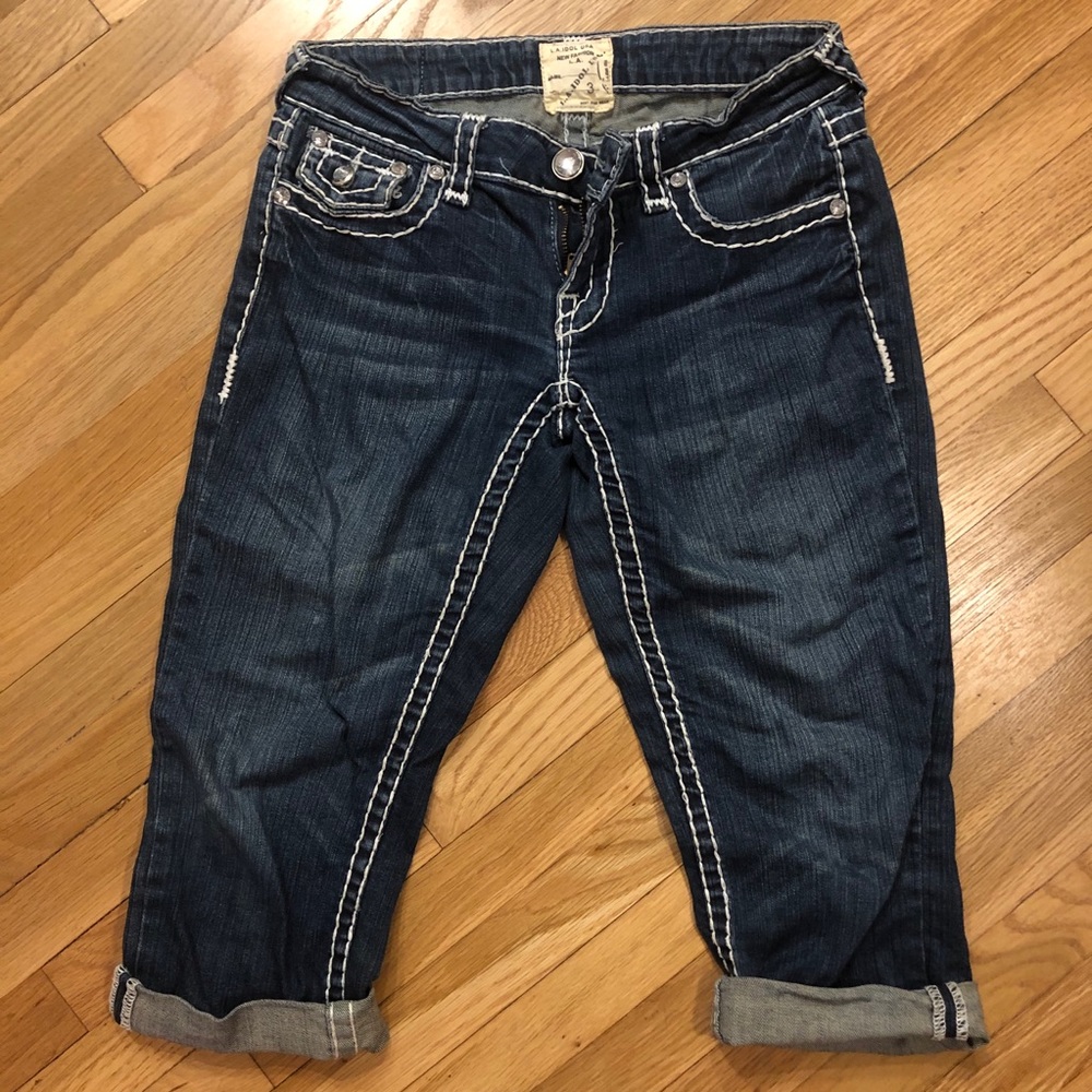 Jean capris with rhinestone buttons
